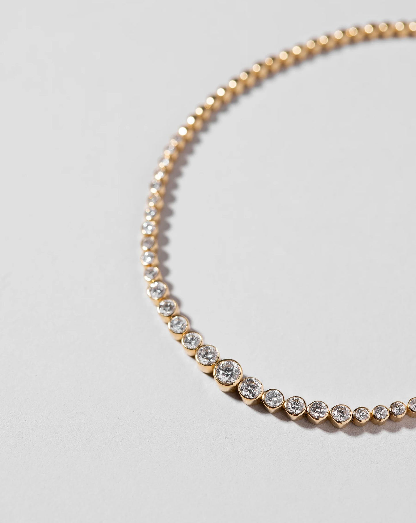 Graduated Bezel Diamond Tennis Bracelet